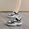 Newness Seoul Street Style Korean Dad Sneakers in white and grey showcasing the chunky sole and trendy design Perfect for everyday wear