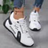 Newness Urban Edge Minimalist Lace Up Sneakers Chic comfortable and perfect for any occasion A close up shot showcasing the minimalist design and lace up detail