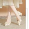 Newness Ethereal Bloom Floral Block Heels Elevate your style with these chic and comfortable floral block heels perfect for any occasion