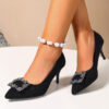 Midnight Sparkle Rhinestone Pointed Heels by Newness Elegant black pointed toe heels adorned with sparkling rhinestones
