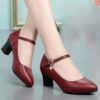 Newness Parisian Chic Black Ankle Strap Pumps Classic black pumps with delicate ankle strap showcasing comfort and style