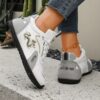 Newness Aurora Luxe White Golden Sneakers Elevate your style with these breathable comfortable sneakers featuring a stylish white and gold design non slip sole perfect for all seasons