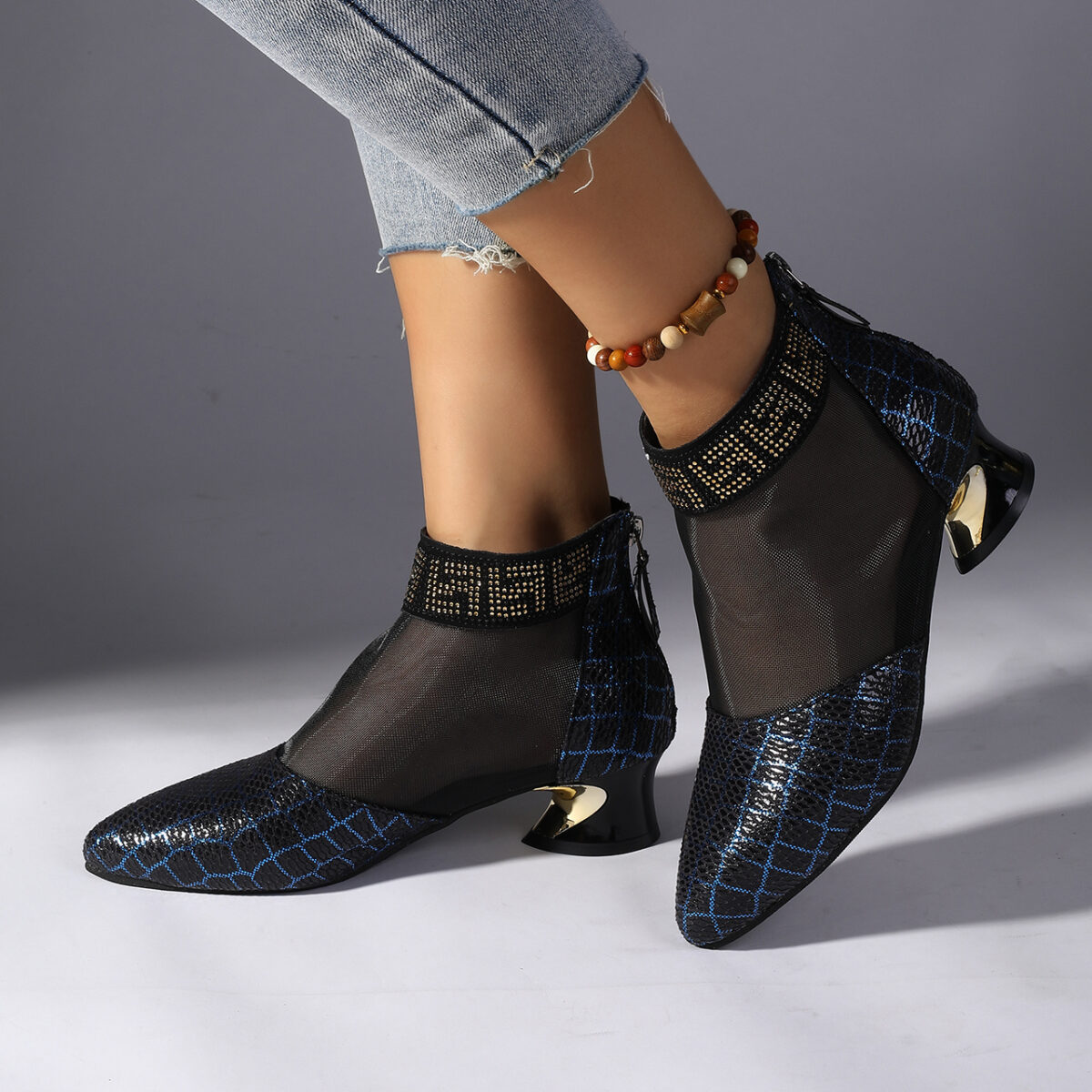 Womens black snakeskin pattern mesh ankle boots with chunky heel pointed toe and rhinestone accents