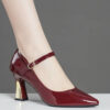 Bordeaux Nights Burgundy Mary Jane Heels by Newness These elegant heels feature a glossy finish a comfortable block heel and an adjustable ankle strap perfect for spring events