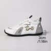 Newness Aurora Luxe White Golden Sneakers Elevate your style with these breathable comfortable sneakers featuring a stylish white and gold design non slip sole perfect for all seasons