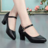 Newness Parisian Chic Black Ankle Strap Pumps Classic black pumps with delicate ankle strap showcasing comfort and style
