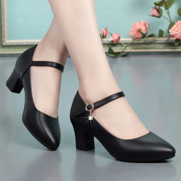 Newness Parisian Chic Black Ankle Strap Pumps Classic black pumps with delicate ankle strap showcasing comfort and style