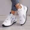 Newness Urban Edge Minimalist Lace Up Sneakers Chic comfortable and perfect for any occasion A close up shot showcasing the minimalist design and lace up detail