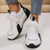 Newness Golden Dragon Accent Black Sneakers Sleek black sneakers adorned with a golden dragon accent showcasing breathable comfort and edgy design