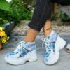 Newness Celestial Butterfly Print Sneakers Trendy comfortable sneakers featuring a celestial butterfly print Perfect for any occasion
