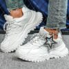 Newness Stellar Stride Chunky Platform Sneakers in white showcasing the platform sole and stylish design Perfect for elevating any outfit