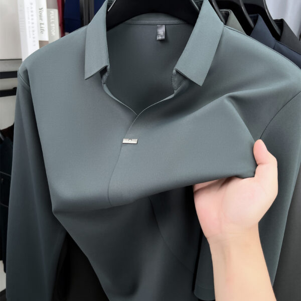 SharpStyle Men's Wrinkle-Resistant Dress Shirt in crisp white, showcasing its tailored fit and smooth texture. Ideal for both business and casual settings.