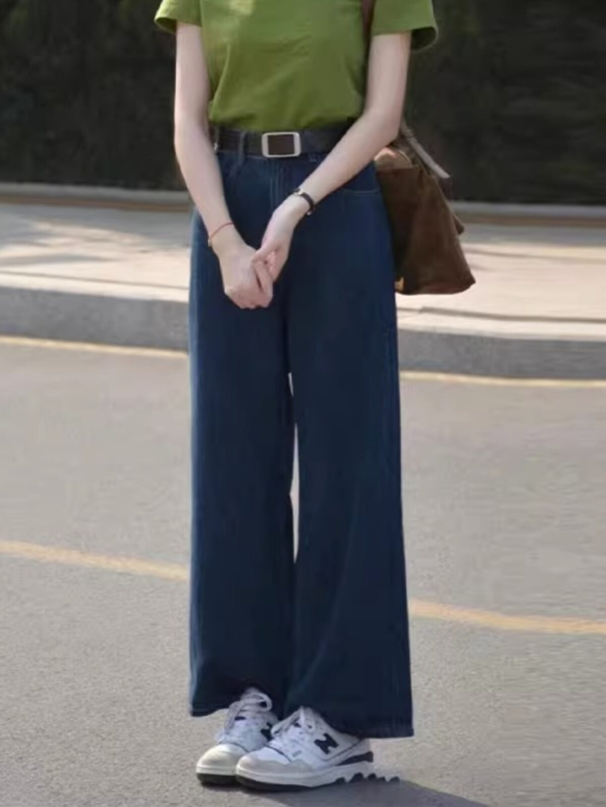 Newness Effortless Chic High Waisted Wide Leg Jeans in a flattering light wash showcasing the perfect wide leg and high waist