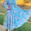 Embrace Parisian chic in the Newness Azure Bloom Floral Print Dress This stunning summer dress features a vibrant floral print
