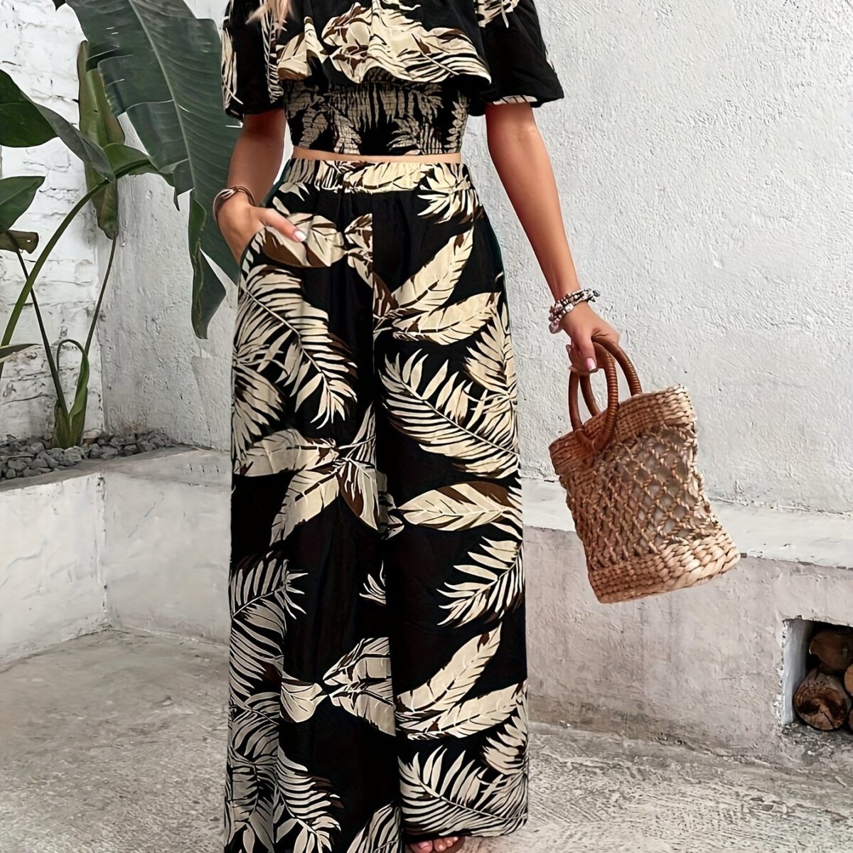 Escape to Paradise Model wearing the Newness Tropical Print Set showcasing its effortless chic style Perfect for summer days and nights