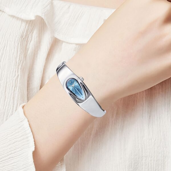 Celestial Dewdrop Water Drop Watch: A close-up view of the elegant, minimalist PINTIME watch, showcasing its unique waterdrop design and sophisticated style.