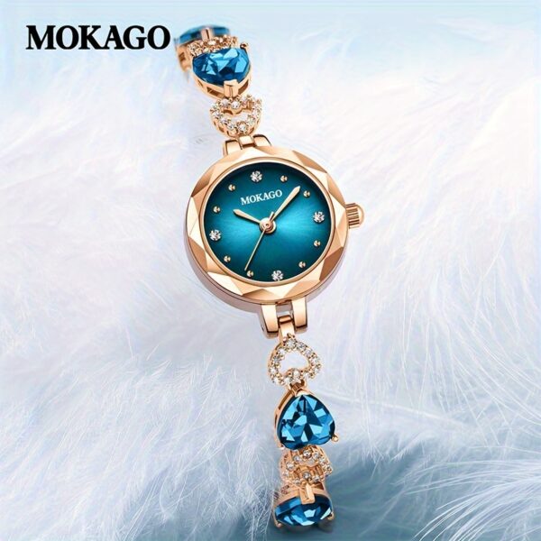 MKGO Blue Crystal Heart Watch for Women, close-up showcasing blue crystal heart bracelet and watch face details.